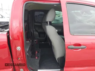 2020 Toyota Tacoma SR with VIN 3TYRX5GNXLT005469, listed as a IAAI auction lot 42267836 with 84,628 mi miles and . Bid and sale history available at DreamBid. Image 8.
