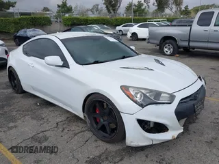 2014 Hyundai Genesis Coupe R-Spec z VIN KMHHT6KD3EU118357, wystawiony jako IAAI lot #40970527 z przebiegiem 94 174 mil mil oraz . Historia ofert i sprzedaży dostępna na DreamBid. Obrazek 1.