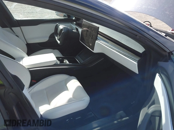 2021 Tesla Model S Plaid with VIN 5YJSA1E60MF455768, listed as a IAAI auction lot 41603504 with 27,398 mi miles. Bid and sale history available at carsss.com. Image 5.