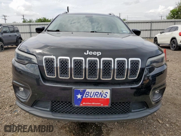 2019 Jeep Cherokee Latitude with VIN 1C4PJLCB6KD264183, listed as a Copart auction lot 64871745 with 121,556 mi miles and Salvage title. Bid and sale history available at DreamBid. Image 5.