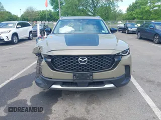 2023 Mazda CX-50 Meridian Edition z VIN 7MMVABXYXPN130990, wystawiony jako IAAI lot #42212027 z przebiegiem 49 015 mil mil oraz . Historia ofert i sprzedaży dostępna na DreamBid. Obrazek 12.