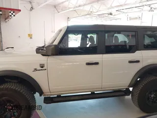 2022 Ford Bronco z VIN 1FMDE5BH1NLB16280, wystawiony jako IAAI lot #42440295 z przebiegiem 37 738 mil mil oraz . Historia ofert i sprzedaży dostępna na DreamBid. Obrazek 14.
