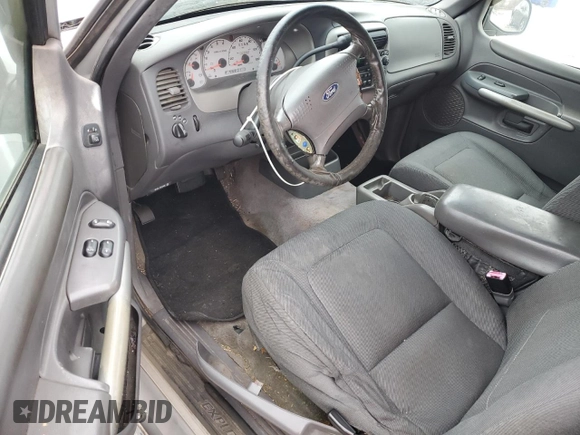 2001 Ford Explorer Sport z VIN 1FMYU60E91UC17672, wystawiony jako Copart lot #86739594 z przebiegiem 232 066 mil mil oraz Tytuł czysty. Historia ofert i sprzedaży dostępna na DreamBid. Obrazek 8.