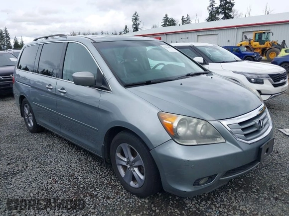 2008 Honda Odyssey Touring with VIN 5FNRL38908B098771, listed as a IAAI auction lot 41878646 with 167,834 mi miles. Bid and sale history available at carsss.com. Image 1.