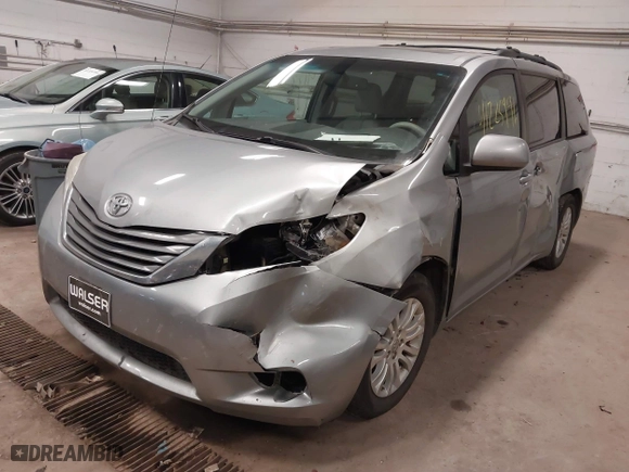 2013 Toyota Sienna XLE AAS with VIN 5TDYK3DC0DS377112, listed as a IAAI auction lot 41225996 with 149,814 mi miles. Bid and sale history available at carsss.com. Image 17.
