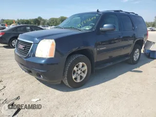 2007 GMC Yukon SLT with VIN 1GKFK13057J345796, listed as a Copart auction lot 71773124 with 218,788 mi miles and Salvage Title. Bid and sale history available at carsss.com. Image 1.