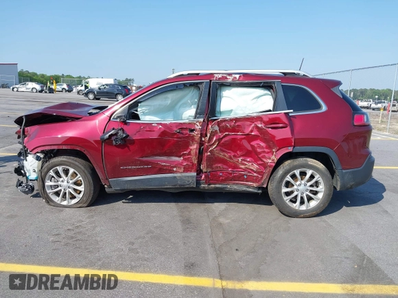 2019 Jeep Cherokee Latitude with VIN 1C4PJLCB4KD358305, listed as a IAAI auction lot 41990957 with 121,024 mi miles. Bid and sale history available at carsss.com. Image 15.