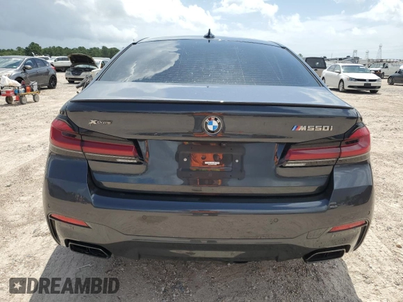 2022 BMW 5 Series M550i xDrive z VIN WBA13BK09NCJ00508, wystawiony jako Copart lot #58077634 z przebiegiem Nie podano mil oraz . Historia ofert i sprzedaży dostępna na DreamBid. Obrazek 6.