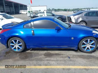 2004 Nissan 350Z Enthusiast z VIN JN1AZ34D34T150619, wystawiony jako IAAI lot #42248408 z przebiegiem 276 869 mil mil oraz . Historia ofert i sprzedaży dostępna na DreamBid. Obrazek 13.