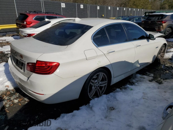 2014 BMW 5 Series 535d with VIN WBAXA5C5XED690305, listed as a Copart auction lot 87819095 with 115,673 mi miles and Salvage Title. Bid and sale history available at carsss.com. Image 3.