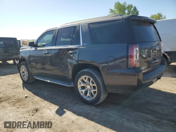 2015 GMC Yukon SLT z VIN 1GKS2BKC9FR147397, wystawiony jako Copart lot #53157845 z przebiegiem 131 552 mil mil oraz Szkoda całkowita • Salvage title. Historia ofert i sprzedaży dostępna na DreamBid. Obrazek 2.