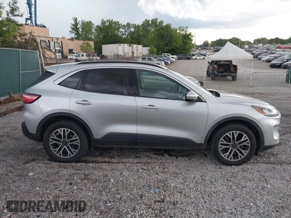 2020 Ford Escape SEL with VIN 1FMCU9H65LUA37178, listed as a IAAI auction lot 42150999 with 107,722 mi miles and . Bid and sale history available at DreamBid. Image 13.