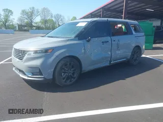 2024 Kia Carnival SX Prestige with VIN KNDNE5H32R6340005, listed as a IAAI auction lot 41984379 with 37,525 mi miles and . Bid and sale history available at DreamBid. Image 2.