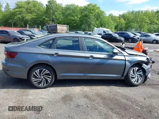 2020 Volkswagen Jetta SEL z VIN 3VWEB7BU2LM024016, wystawiony jako IAAI lot #42341318 z przebiegiem 40 480 mil mil oraz . Historia ofert i sprzedaży dostępna na DreamBid. Obrazek 13.