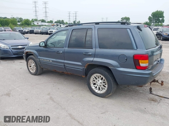 2002 Jeep Grand Cherokee Limited with VIN 1J4GW58NX2C184028, listed as a IAAI auction lot 42503836 with 121,193 mi miles and . Bid and sale history available at DreamBid. Image 3.