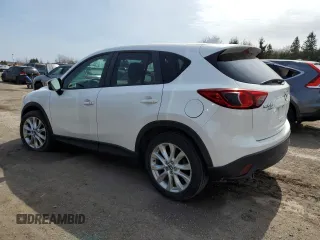 2014 Mazda CX-5 Grand Touring with VIN JM3KE4DY1E0361849, listed as a Copart auction lot 52043465 with 349,688 mi miles and Clean Title. Bid and sale history available at carsss.com. Image 2.