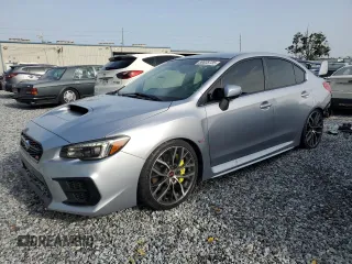 2020 Subaru WRX STI z VIN JF1VA2E65L9818633, wystawiony jako Copart lot #59835735 z przebiegiem 33 582 mil mil oraz Szkoda całkowita • Salvage title. Historia ofert i sprzedaży dostępna na DreamBid. Obrazek 1.