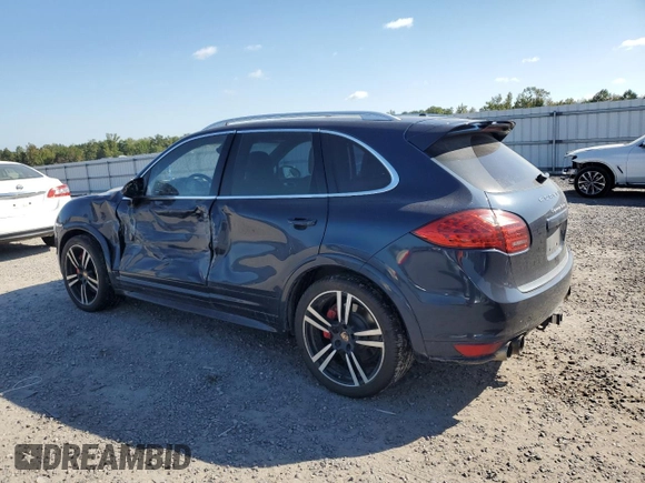 2014 Porsche Cayenne Turbo with VIN WP1AC2A27ELA87214, listed as a Copart auction lot 74175554 with 122,988 mi miles and Salvage title. Bid and sale history available at DreamBid. Image 2.