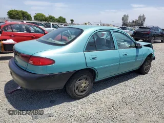 1999 Ford Escort LX with VIN 1FAFP10P6XW196483, listed as a Copart auction lot 59215635 with 74,859 mi miles and Salvage title. Bid and sale history available at DreamBid. Image 3.