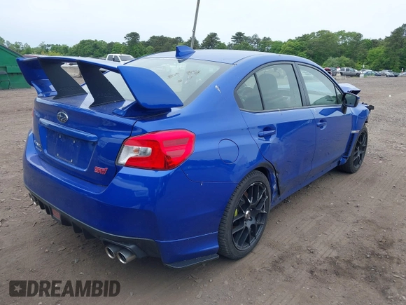 2020 Subaru WRX STI with VIN JF1VA2E61L9833954, listed as a IAAI auction lot 42336349 with 58,668 mi miles and . Bid and sale history available at DreamBid. Image 4.