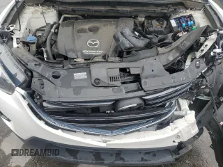 2016 Mazda CX-5 Grand Touring with VIN JM3KE2DYXG0839774, listed as a Copart auction lot 52336275 with 125,605 mi miles and Salvage Title. Bid and sale history available at carsss.com. Image 12.