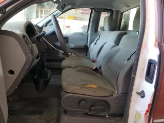 2007 Ford F-150 XL z VIN 1FTRF14WX7KB49430, wystawiony jako Copart lot #59570415 z przebiegiem 249 154 mil mil oraz Czysty tytuł • Clean title. Historia ofert i sprzedaży dostępna na DreamBid. Obrazek 7.
