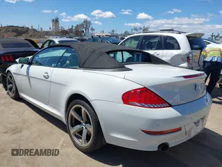 2009 BMW 6 Series 650i z VIN WBAEB53579CX64649, wystawiony jako IAAI lot #41937705 z przebiegiem 136 164 mil mil oraz . Historia ofert i sprzedaży dostępna na DreamBid. Obrazek 3.