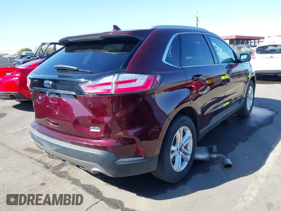 2019 Ford Edge SEL z VIN 2FMPK4J9XKBB10449, wystawiony jako IAAI lot #41614536 z przebiegiem 83 879 mil mil oraz . Historia ofert i sprzedaży dostępna na DreamBid. Obrazek 4.