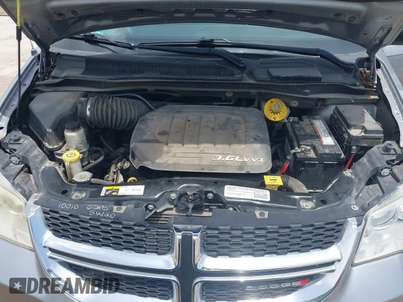 2015 Dodge Grand Caravan American Value with VIN 2C4RDGBGXFR542672, listed as a IAAI auction lot 42230608 with 102,753 mi miles and . Bid and sale history available at DreamBid. Image 10.