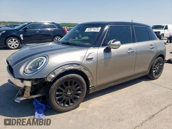2017 MINI Hardtop 4 Door Cooper with VIN WMWXU1C53H2E18438, listed as a Copart auction lot 52871475 with 133,235 mi miles and Salvage Title. Bid and sale history available at DreamBid. Image 1.