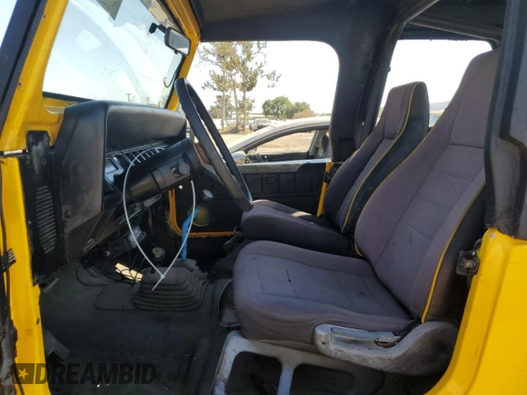 1992 Jeep Wrangler z VIN 2J4FY19P1NJ533862, wystawiony jako Copart lot #69116634 z przebiegiem 105 340 mil mil oraz Czysty tytuł • Clean title. Historia ofert i sprzedaży dostępna na DreamBid. Obrazek 7.