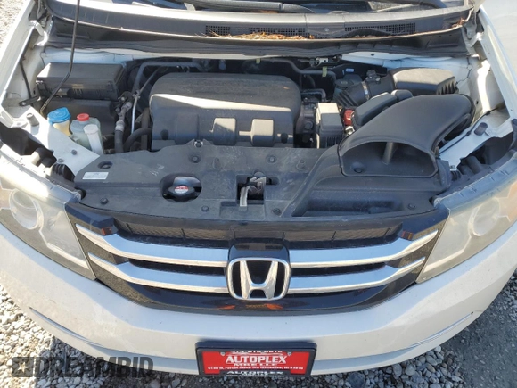 2015 Honda Odyssey EX-L with VIN 5FNRL5H69FB129773, listed as a Copart auction lot 48389155 with 143,047 mi miles and Clean Title. Bid and sale history available at DreamBid. Image 12.