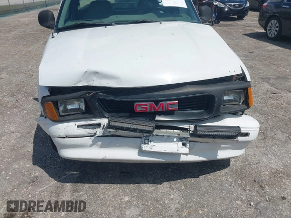 1997 GMC Sonoma z VIN 1GTCS1441VK518317, wystawiony jako IAAI lot #41942735 z przebiegiem 75 862 mil mil oraz . Historia ofert i sprzedaży dostępna na DreamBid. Obrazek 6.