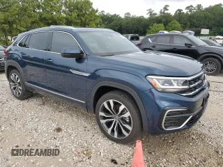 2023 Volkswagen Atlas SEL Premium R-Line z VIN 1V2FE2CA7PC224093, wystawiony jako Copart lot #59274104 z przebiegiem 6 716 mil mil oraz Czysty tytuł • Clean title. Historia ofert i sprzedaży dostępna na DreamBid. Obrazek 4.