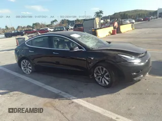 2020 Tesla Model 3 Long Range z VIN 5YJ3E1EB1LF790865, wystawiony jako IAAI lot #29341588 z przebiegiem 2 082 mil mil oraz . Historia ofert i sprzedaży dostępna na DreamBid. Obrazek 1.