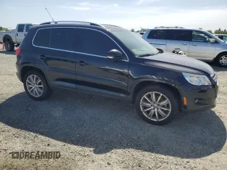2011 Volkswagen Tiguan SEL w/Premium Navi with VIN WVGAV7AX2BW550158, listed as a Copart auction lot 57649235 with 133,346 mi miles and Clean title. Bid and sale history available at DreamBid. Image 4.