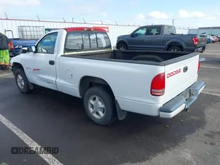 1999 Dodge Dakota SLT with VIN 1B7FL26X9XS109444, listed as a IAAI auction lot 41753871 with 254,190 mi miles. Bid and sale history available at carsss.com. Image 3.