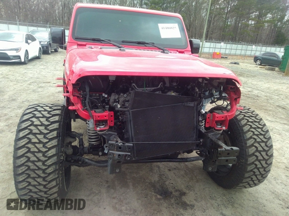 2022 Jeep Wrangler Unlimited Sahara with VIN 1C4JJXP62NW136932, listed as a IAAI auction lot 41486025 with 36,986 mi miles and . Bid and sale history available at DreamBid. Image 6.
