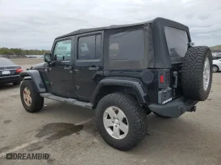 2011 Jeep Wrangler Unlimited Sahara with VIN 1J4HA5H14BL507148, listed as a Copart auction lot 52480325 with 233,835 mi miles and Clean Title. Bid and sale history available at carsss.com. Image 2.