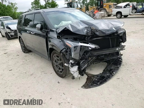 2025 Kia Carnival SX with VIN KNDNE5K37S6490478, listed as a Copart auction lot 51389565 with 6,929 mi miles and Salvage Title. Bid and sale history available at DreamBid. Image 12.