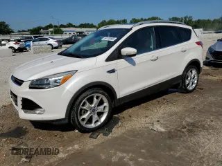 2015 Ford Escape Titanium с VIN 1FMCU0J93FUA58325, выставлен на аукционе Copart как лот 64135685 с пробегом 126 356 миль миль и Списание • Salvage title. История ставок и продаж доступна на DreamBid. Изображение 1.