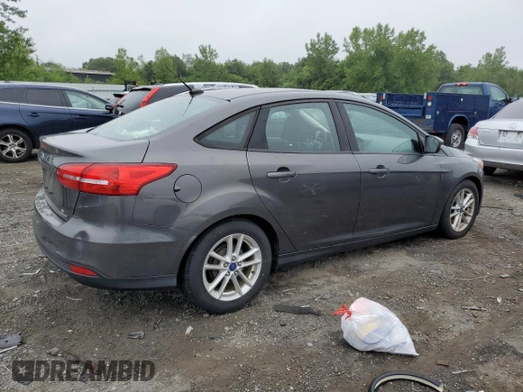 2015 Ford Focus SE with VIN 1FADP3F22FL285353, listed as a Copart auction lot 60443685 with 149,878 mi miles and Clean title. Bid and sale history available at DreamBid. Image 3.