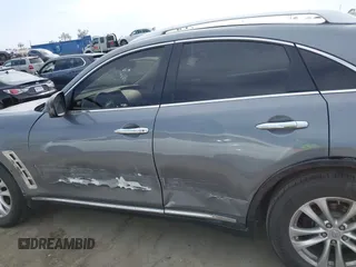 2014 Infiniti QX70 with VIN JN8CS1MU8EM450428, listed as a IAAI auction lot 42233727 with 88,342 mi miles and . Bid and sale history available at DreamBid. Image 14.