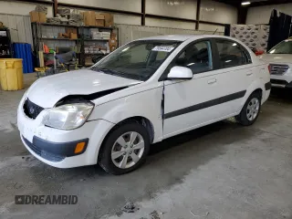 2009 Kia Rio LX with VIN KNADE223096575843, listed as a Copart auction lot 79894704 with 62,672 mi miles and Clean Title. Bid and sale history available at carsss.com. Image 1.