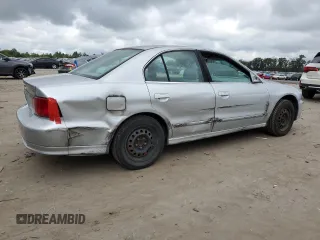 2002 Mitsubishi Galant ES z VIN 4A3AA46G42E117189, wystawiony jako Copart lot #68738064 z przebiegiem 147 493 mil mil oraz Szkody całkowita. Historia ofert i sprzedaży dostępna na DreamBid. Obrazek 3.