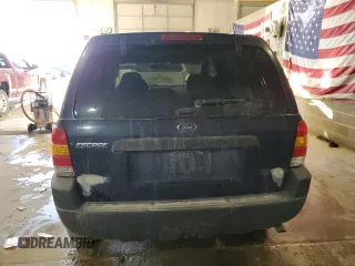 2004 Ford Escape XLS with VIN 1FMYU92154KA14600, listed as a Copart auction lot 83101474 with 305,444 mi miles and Salvage Title. Bid and sale history available at DreamBid. Image 6.