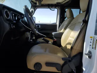 2018 Jeep Wrangler Unlimited Sahara with VIN 1C4HJXEG6JW112198, listed as a Copart auction lot 63412775 with 34,853 mi miles and Salvage title. Bid and sale history available at DreamBid. Image 7.