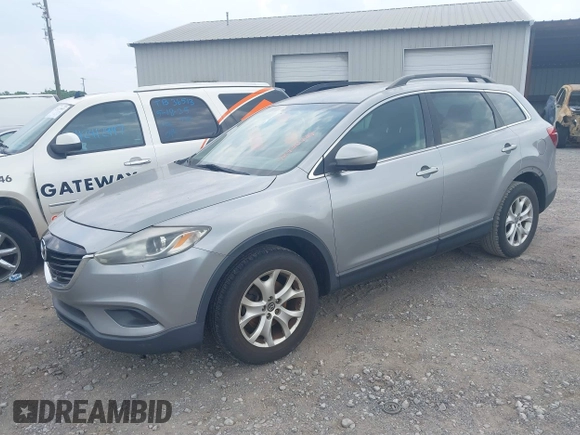 2013 Mazda CX-9 Sport with VIN JM3TB3BA2D0407491, listed as a IAAI auction lot 42430839 with 162,827 mi miles and . Bid and sale history available at DreamBid. Image 2.