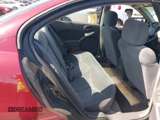 1999 Pontiac Grand Am SE2 with VIN 1G2NE52T0XM702788, listed as a IAAI auction lot 42564414 with 195,067 mi miles and . Bid and sale history available at DreamBid. Image 8.