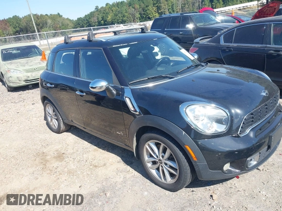 2013 MINI Countryman S ALL4 with VIN WMWZC5C51DWP30972, listed as a IAAI auction lot 40574307 with 153,570 mi miles and . Bid and sale history available at DreamBid. Image 1.